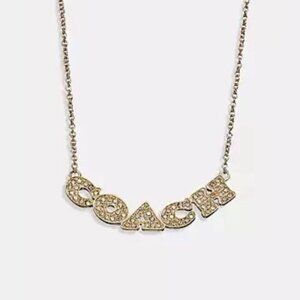 Coach Pave Pendant Crystal Spellout Gold Tone Collar Necklace